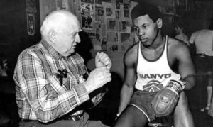 Young Mike Tyson and Cus D'Amato