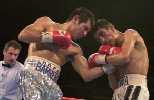 Marco Antonio Barrera and Erik Morales trade punches