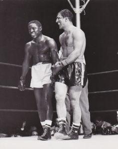 Ezzard Charles and Rocky Marciano after their fight