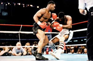Mike Tyson punches Michael Spinks
