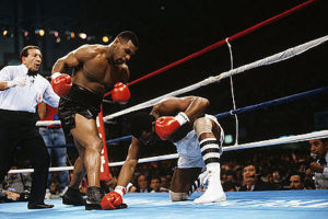Mike Tyson knocks down Michael Spinks
