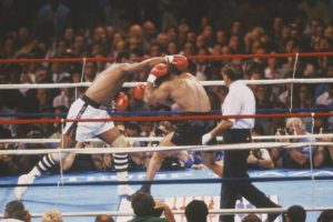 Michael Spinks punches Mike Tyson