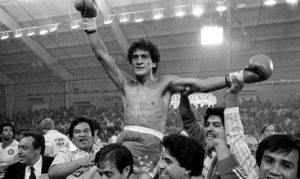 Salvador Sanchez celebrates beating Wilfredo Gomez