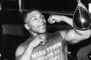 Mike Tyson hits speed bag