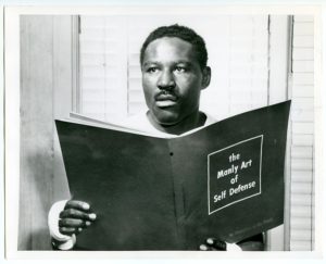Ezzard Charles reads the art of self defence