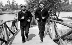 Joe Louis and Jack Blackburn running