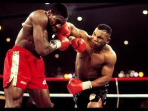 Mike Tyson punches Frank Bruno
