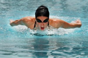 Woman swimming with breakstroke